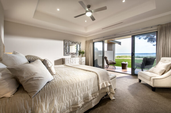 Beach House: Luxury Coastal Home - master bedroom