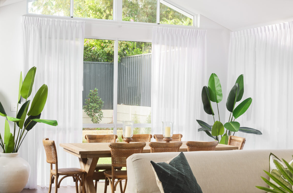 The Lakeview: Past display home - living room floor to celling windows