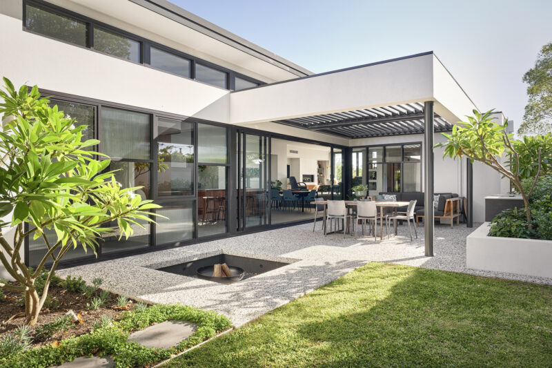 Alfresco with sunken firepit, dining and lounge seating