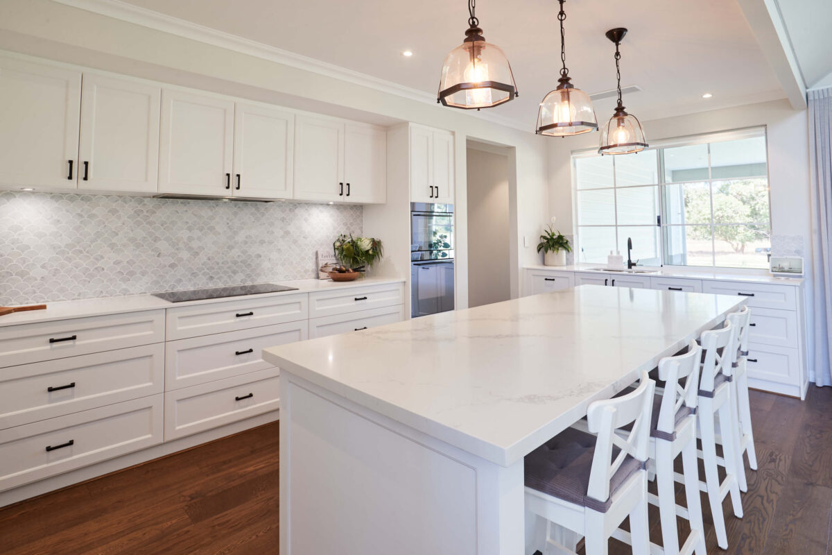 The kitchen is perfectly situated to act as the heart of this family home. Credit: Supplied.