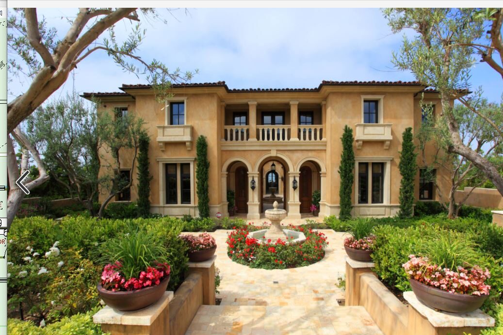 mediterranean inspired villa with flowered, landscaped garden and feature water fountain