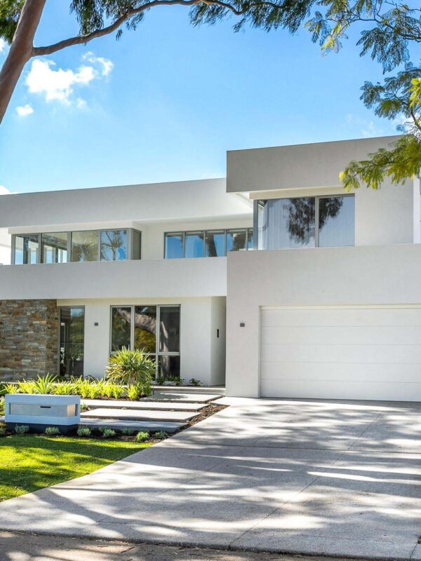 The Modernist contemporary home design is inspired by mid-century modern and modernist architectural styles. The luxury custom home design features striking use of strong horizontal lines and a mix of materials to portray a sense of floating and grandeur. Built by luxury home builder, Oswald Homes.
