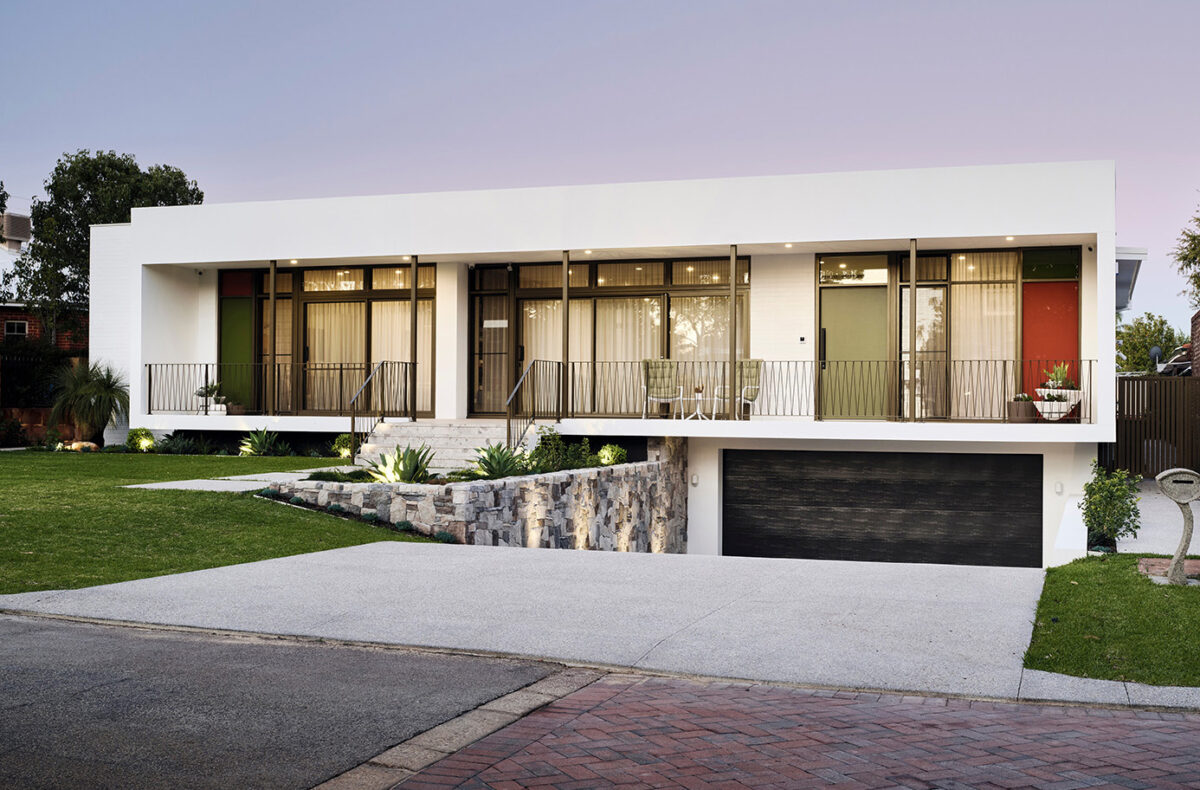 Mic Century modern masterpiece of The Ellwood, features colour glass windors, an undercroft and a modern take on the 60s design. Built by luxury home builders, Oswald Homes.