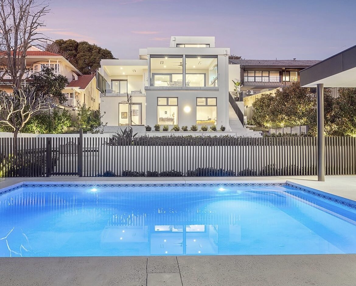 multi level modern home on a sloped block with pool
