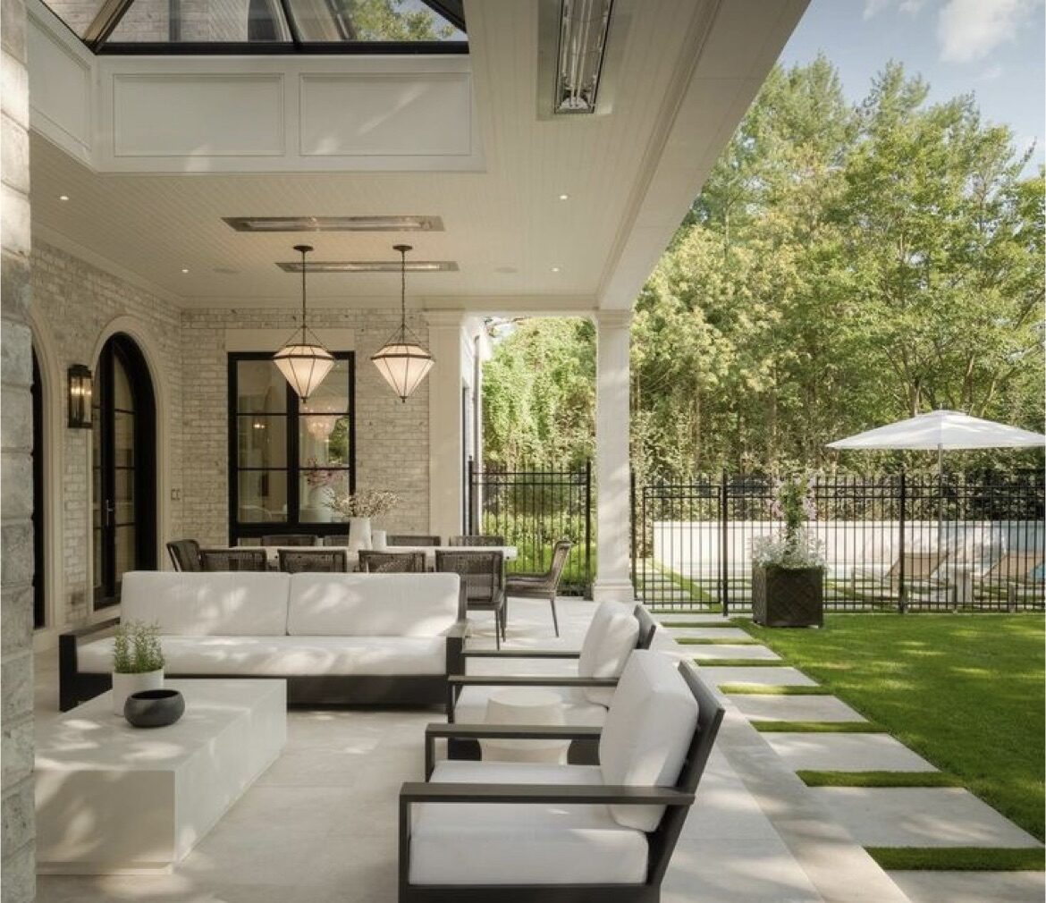 coastal modern alfresco area with stone and black windows