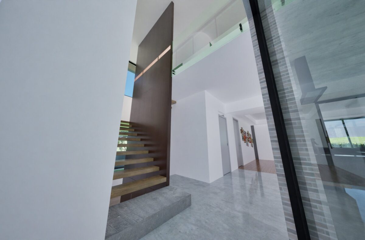 Render of an entry hall with floating staircase